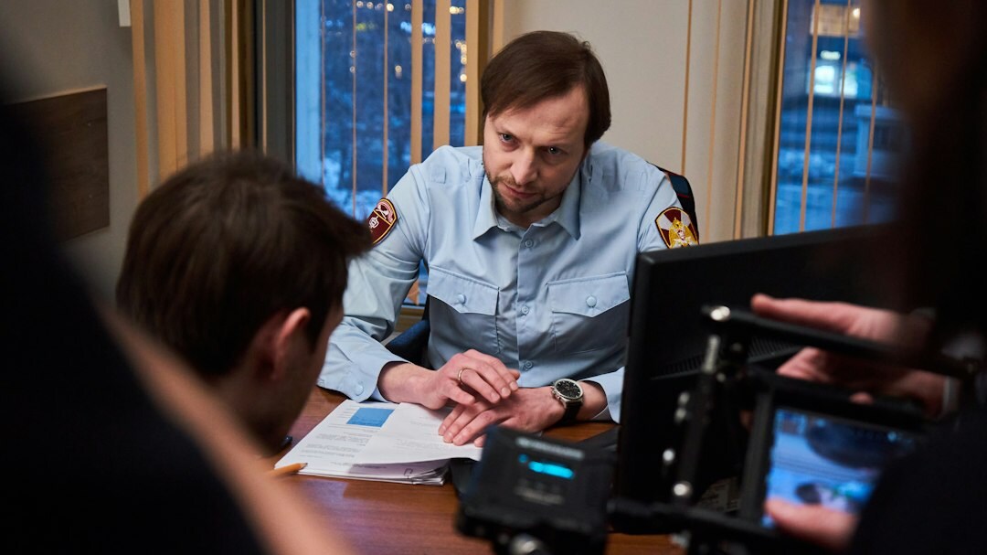 detective reviewing footage