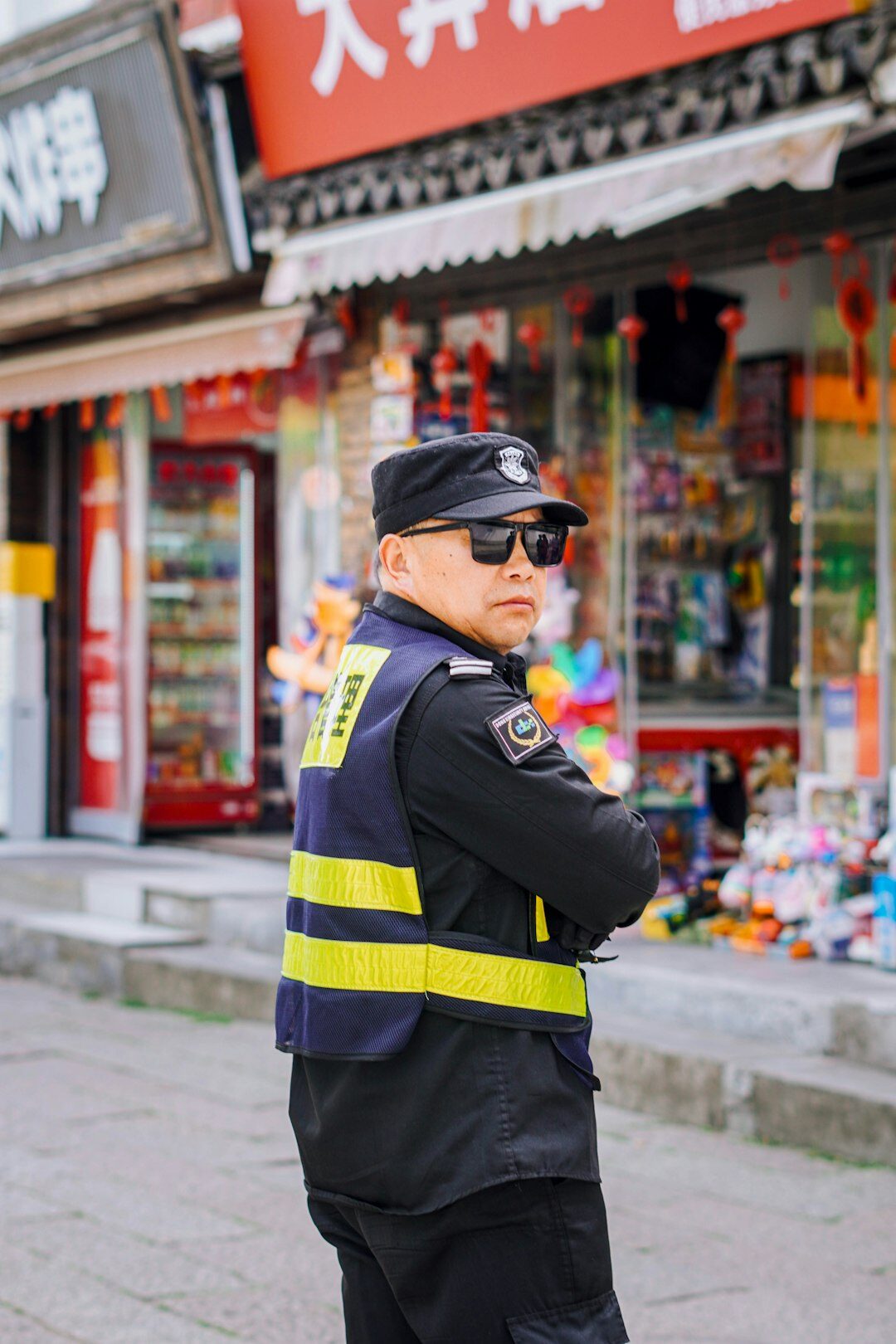 store detective watching customers